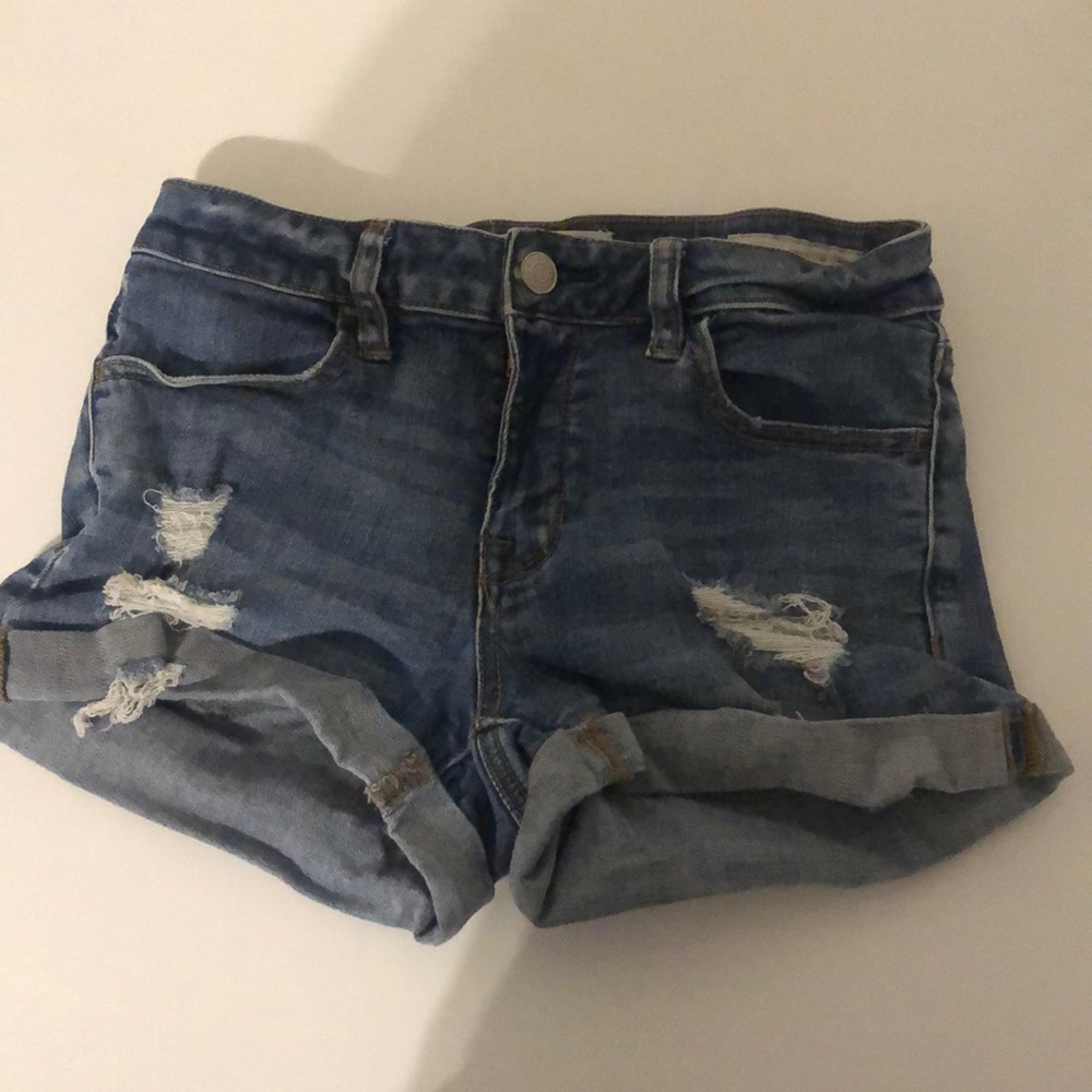 Ripped short jean shorts. 24